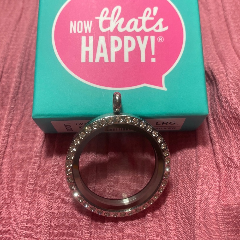 Hinged locket from origami owl.
